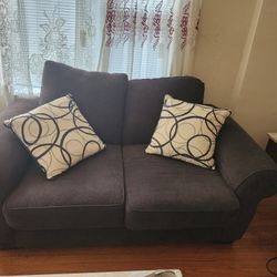 Chic Dark Gray Loveseat couch with Stylish Pillows