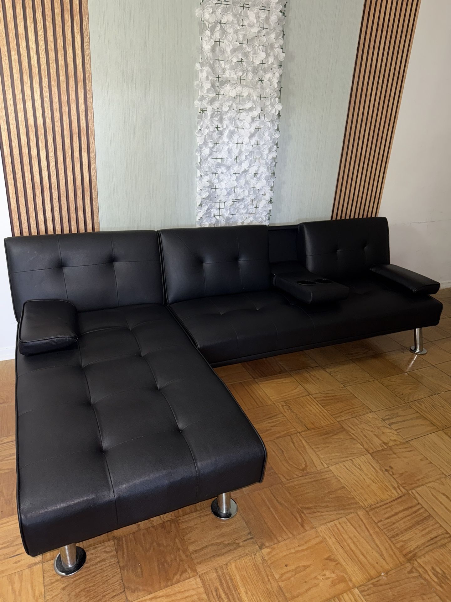 LuxuryGoods Modern Faux Leather Futon with Cupholders and Pillows, Black