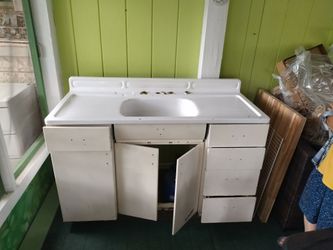 Vintage metal cabinet and countertop sink