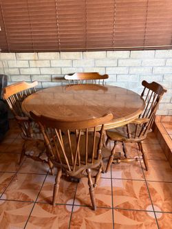 Round Oak Dining Table with matching chairs