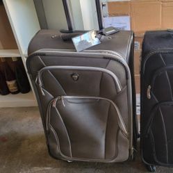 FREE Rolling Check-in Suitcase