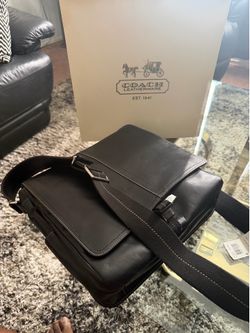Black coach messenger bag