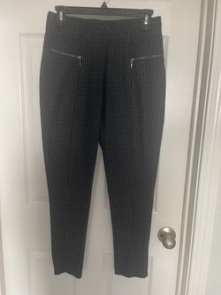 Black Pinstripe Tapered Leg Stylish black pinstripe pants with a tapered leg fit.