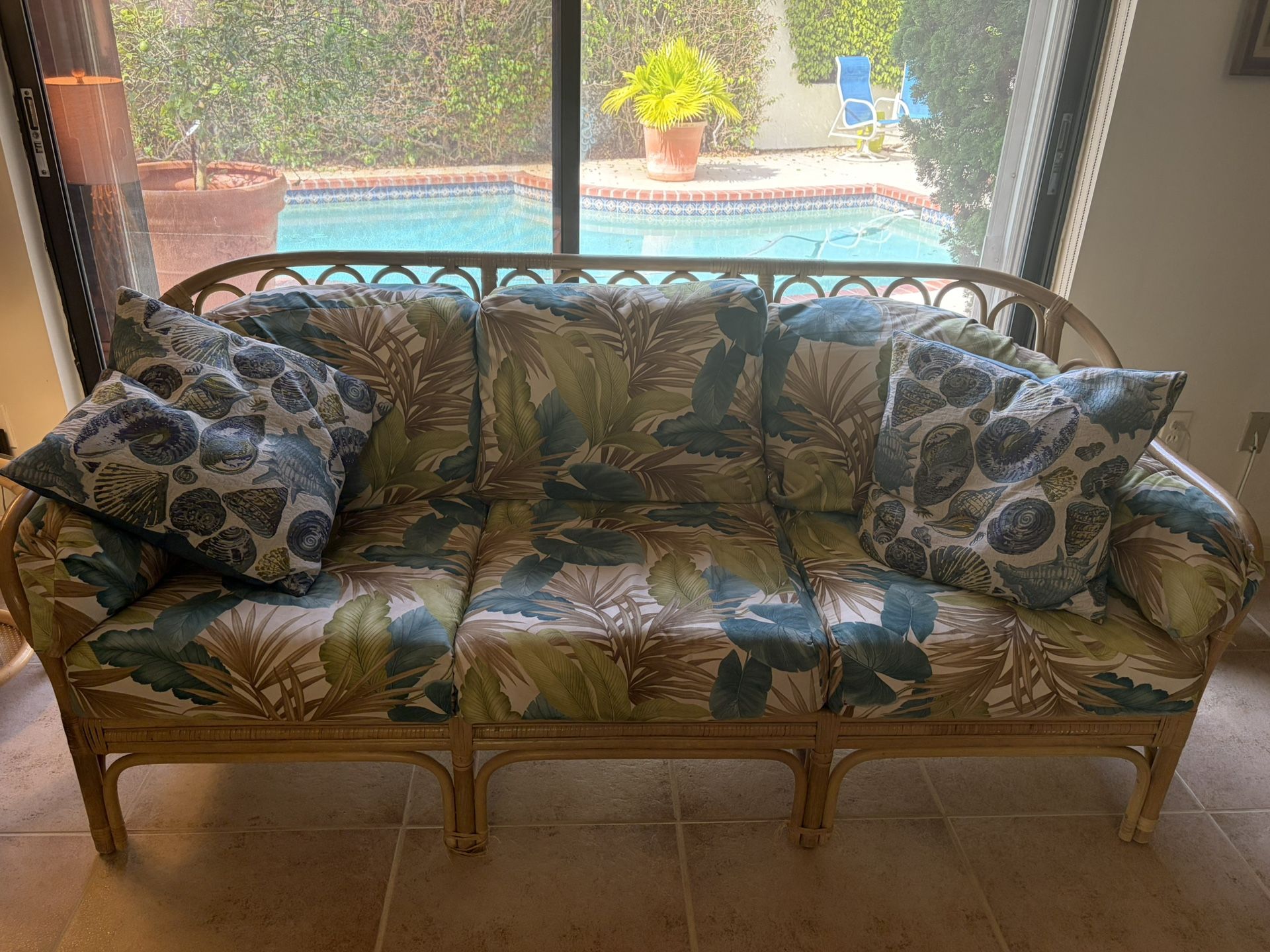 Beautiful Floral Pillows Made On Bamboo Wood Couch