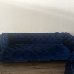 Blue suede couches