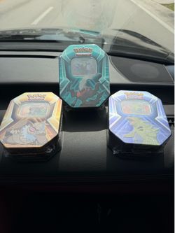 Triple whammy tins (darkrai slaking tyranitar) Pokemon