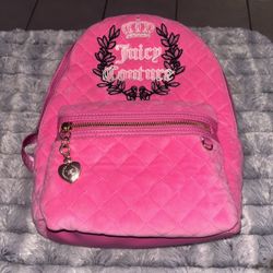 Juicy Couture pink velour quilted backpack with gold hardware and a heart charm. 