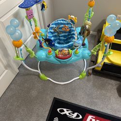 Brand new never used Disney Baby Finding Nemo Sea of Activities Jumper.