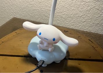 Cinnamoroll figure resting on a cloud base with a flexible lamp arm & Includes 5v rechargeable battery & charger !