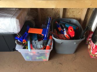 Assorted nerf guns and foam/plastic swords