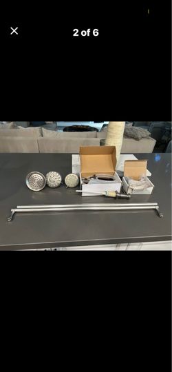 Shower heads, soap dispensers, shower door towel racks & hinges. All Brushed Nickel....
