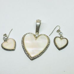 Silver tone pendant and earrings with MOP