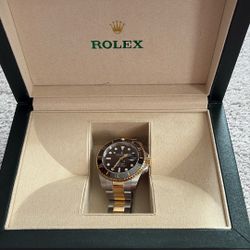 A Gold And Silver Rolex submariner