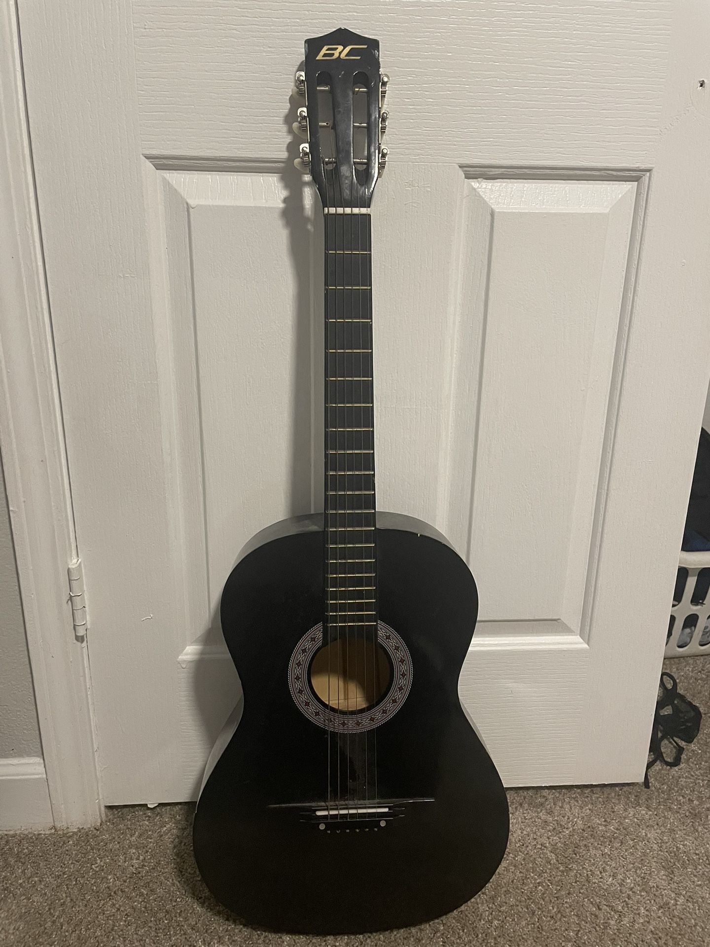 Black acoustic guitar 