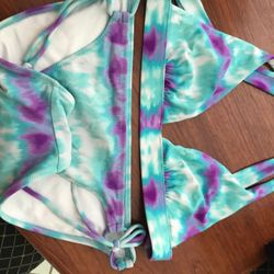 Girls or small women’s Bikini bathing suits.