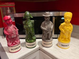 Set of 4 Ceramic Figural Liquor Decanters