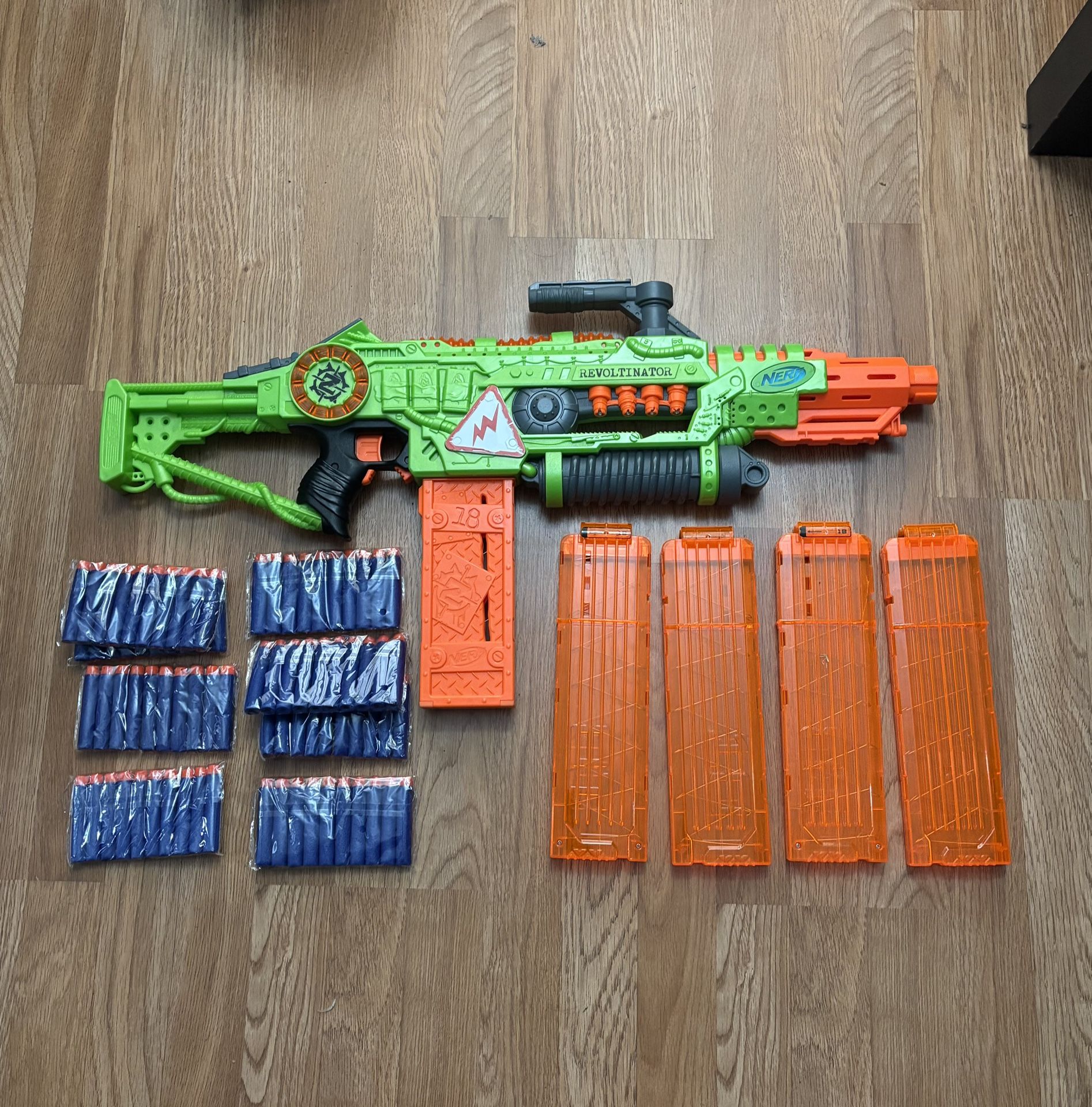 Nerf Revoltinator Zombie Strike Toy Blaster with Motorized Lights Sounds & 18 Official Darts