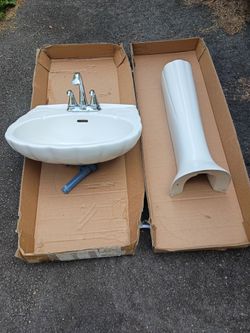 Pedistal sink and faucet