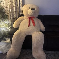 Giant Teddy Bear with Red Bow