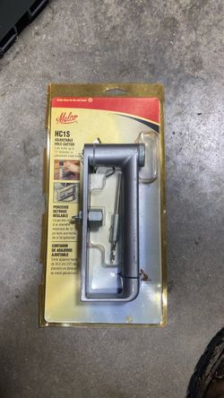 Malco adjustable metal hole cutter.