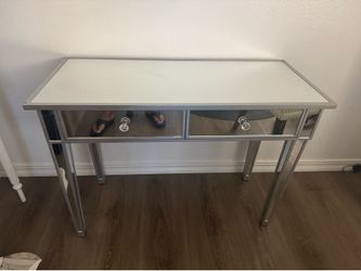 Mirrored credenza table