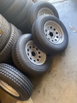 4x trailer tire 205x75-14 8 ply with rim $445  cash no bargain price firm