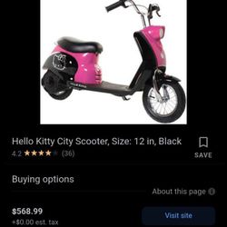 Pink and Black Hello Kitty Electric Scooter..