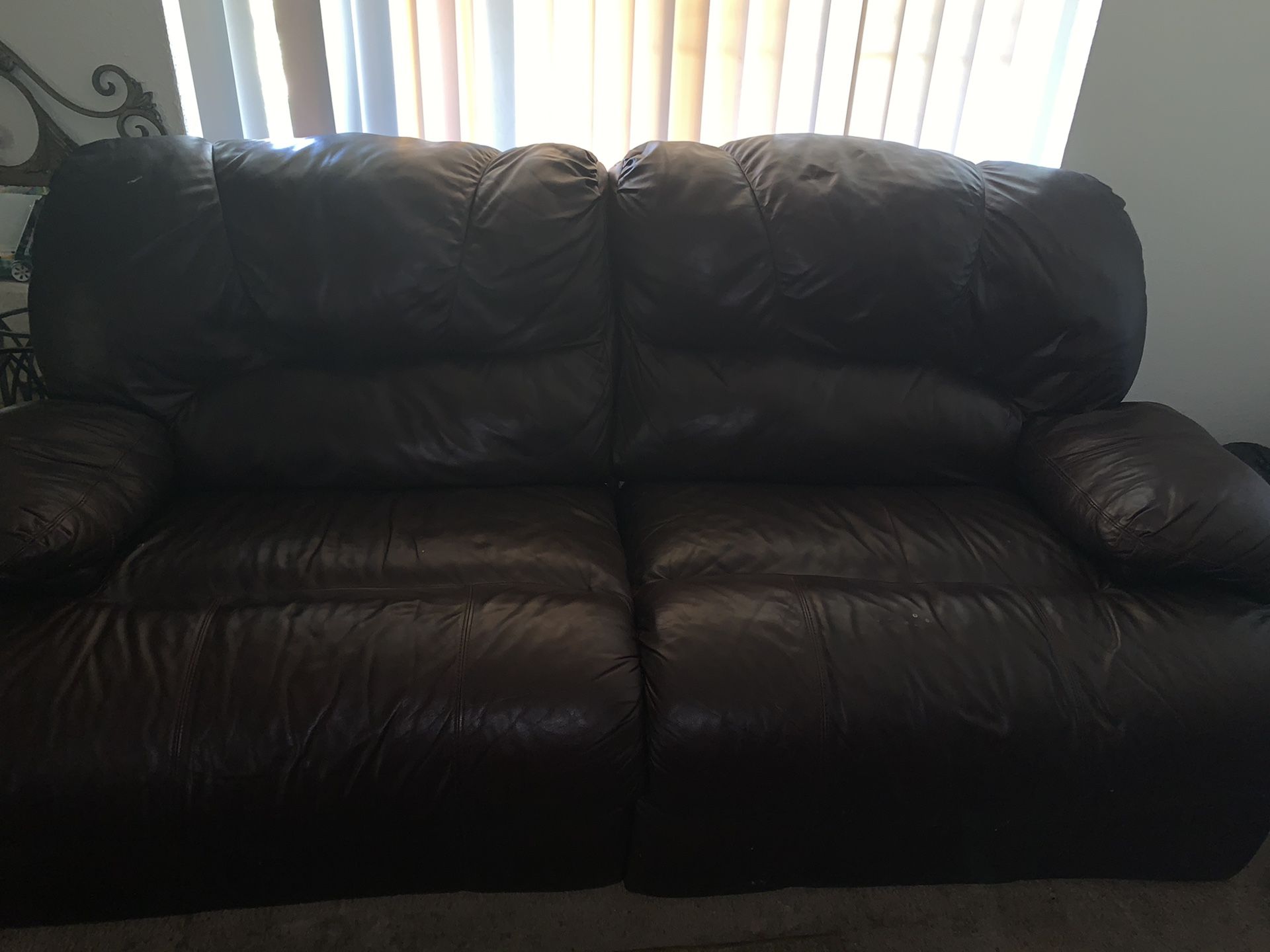 Black sofa and grey recliner