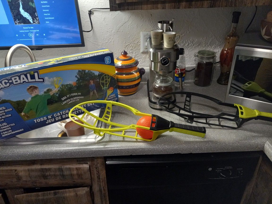 Toss And Catcher Racket Game