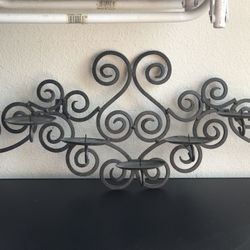 Wall mounted candle holder