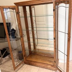 Lighted Glass Curio Cabinet.( 61.5”H x 35”W X 14”D ).