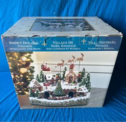 Snowy Holiday Village with Light and Music