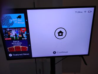 Black Nintendo switch with OLED dock