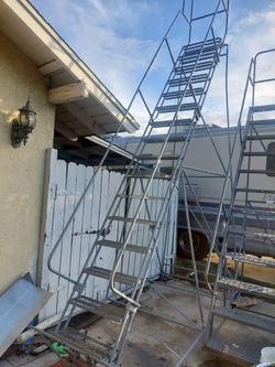 Rolling Ladder  16 Steps  Perfect Condition  450.00