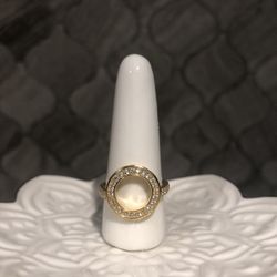 .25 Carat Diamond a halo Enhancer Ring. Yellow Gold finish