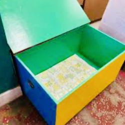 LARGE WOODEN BOX 4 feet by 2 2 feet WHIT HANDLE and side two wheels, very easy to carry pretty clean and painted 