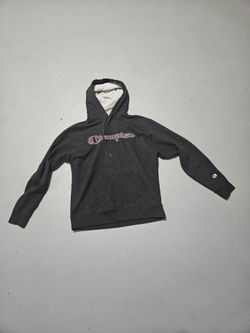 Black champion hoodie with a pink champion logo Size: L