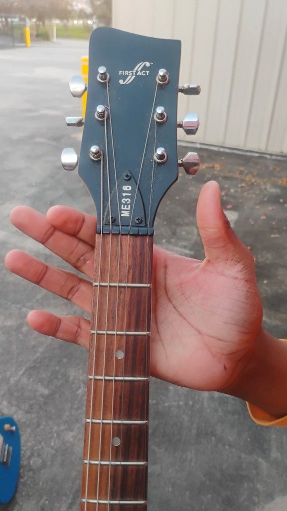 First Act ME318 Guitar