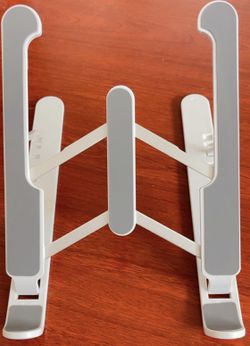 Sleek Foldable Laptop Stand – Adjustable & Portable