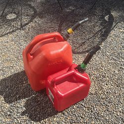 2 gas cans - one brand new