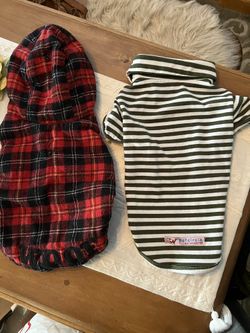 Two dog coats for sale small to medium dog size around 10 pound dog