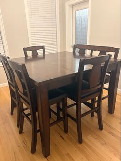 Counter hight dining table with chairs and bench