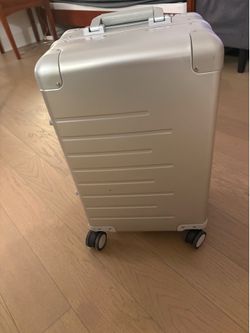 Quince aluminum carry on