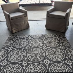 2 chairs and Carpet