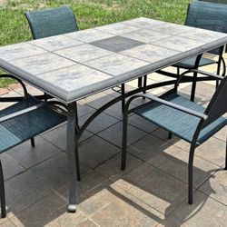 OUTDOOR PATIO SET CERAMIC TABLE AND 4 MATCHING CHAIRS