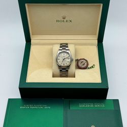 1980s Rolex OysterDate 34mm stainless steel oyster bracelet smooth bezel silver dial 6694 watch box tag appraisal