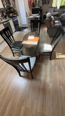 Free Glass dining table plus 4 chairs