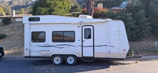 Titan toy hauler trailer kitchen bathroom
