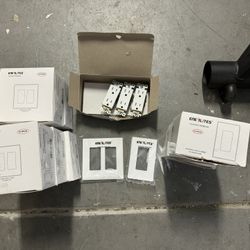 ~40 Double Light Switch Plates, ~22 Single Light Switch Plates, 3 Outlet Plugs