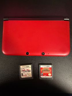 Red Nintendo 3DS XL with 2 DS Games